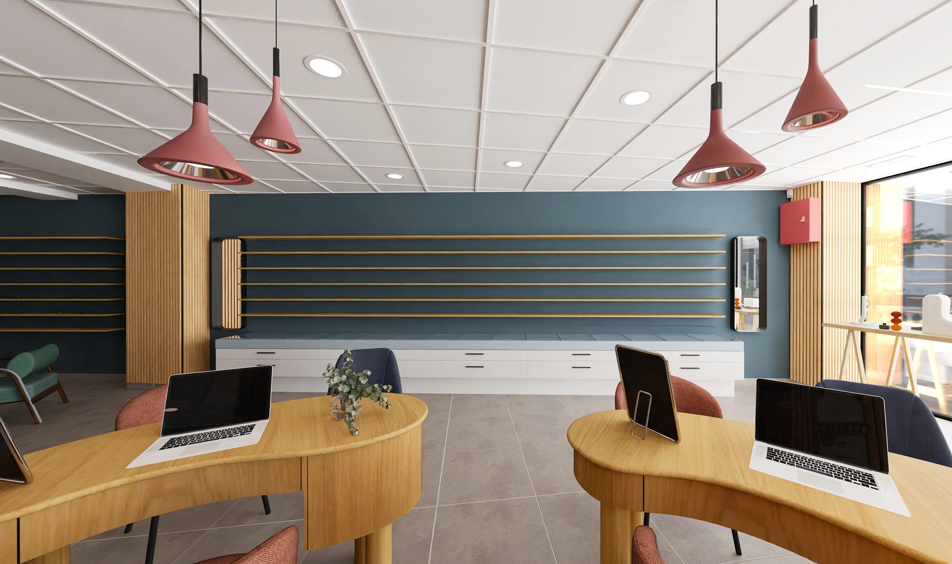 Espace d'attente moderne dans la boutique professionnelle d'Hadecoville, des lampes suspendues contemporaines, des murs bleus et des étagères en bois encastrées - un mélange parfait de style contemporain et de confort accueillant.